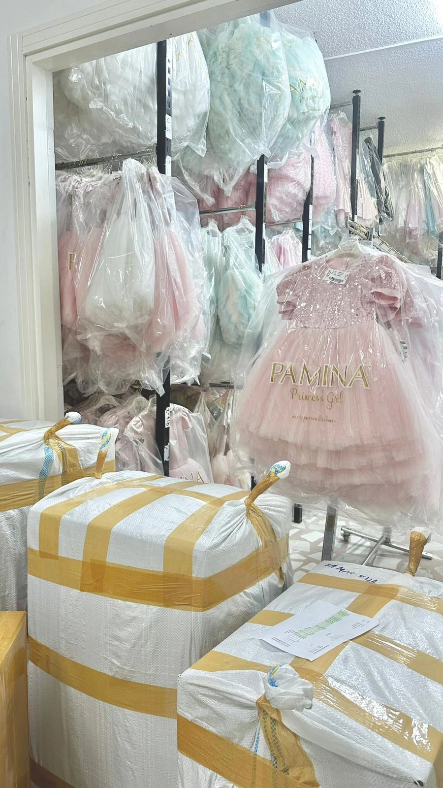 Protected Pamina garments and packed orders in the preparation area